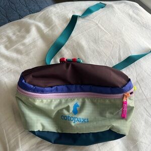Cotopaxi Multicolor Del Día Waist Pack with Teal Strap
